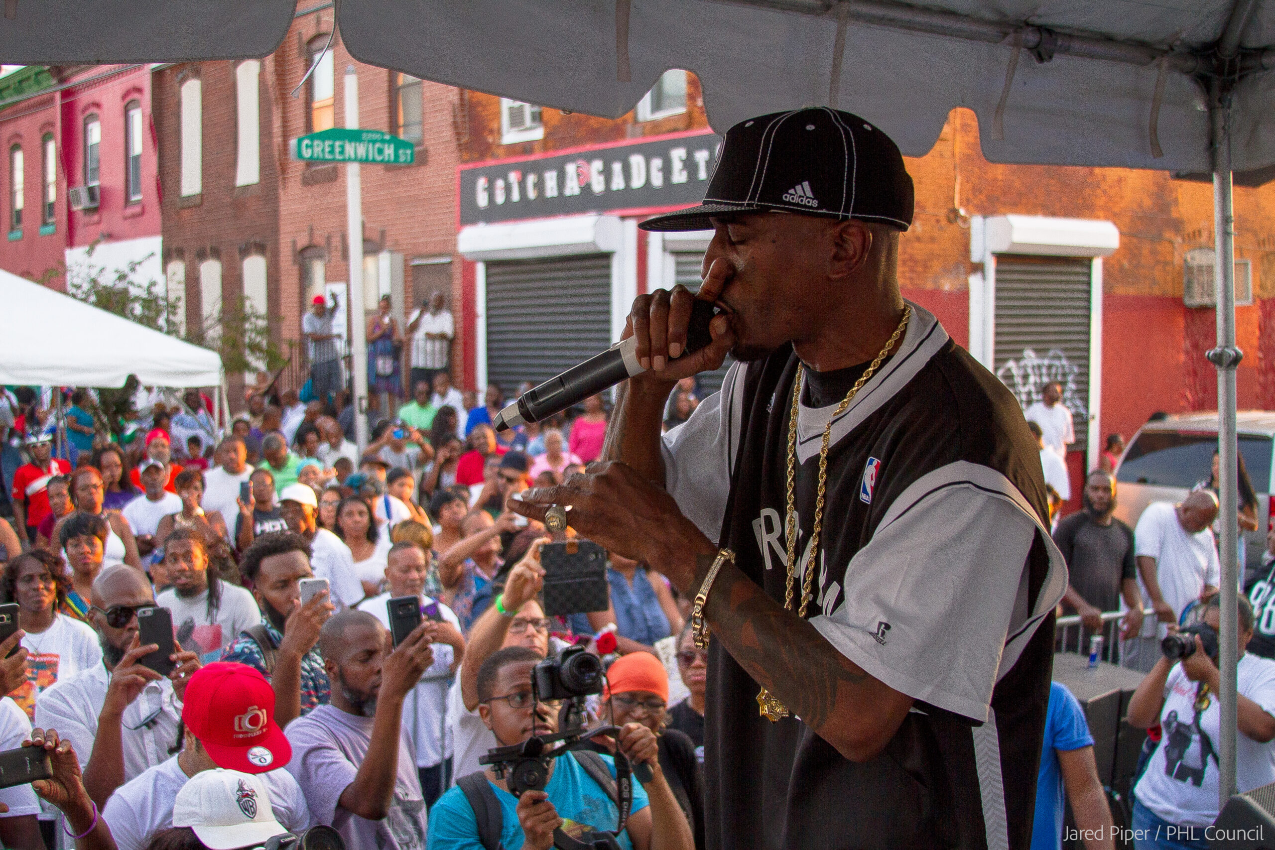 rapper on stage in front of a crowd