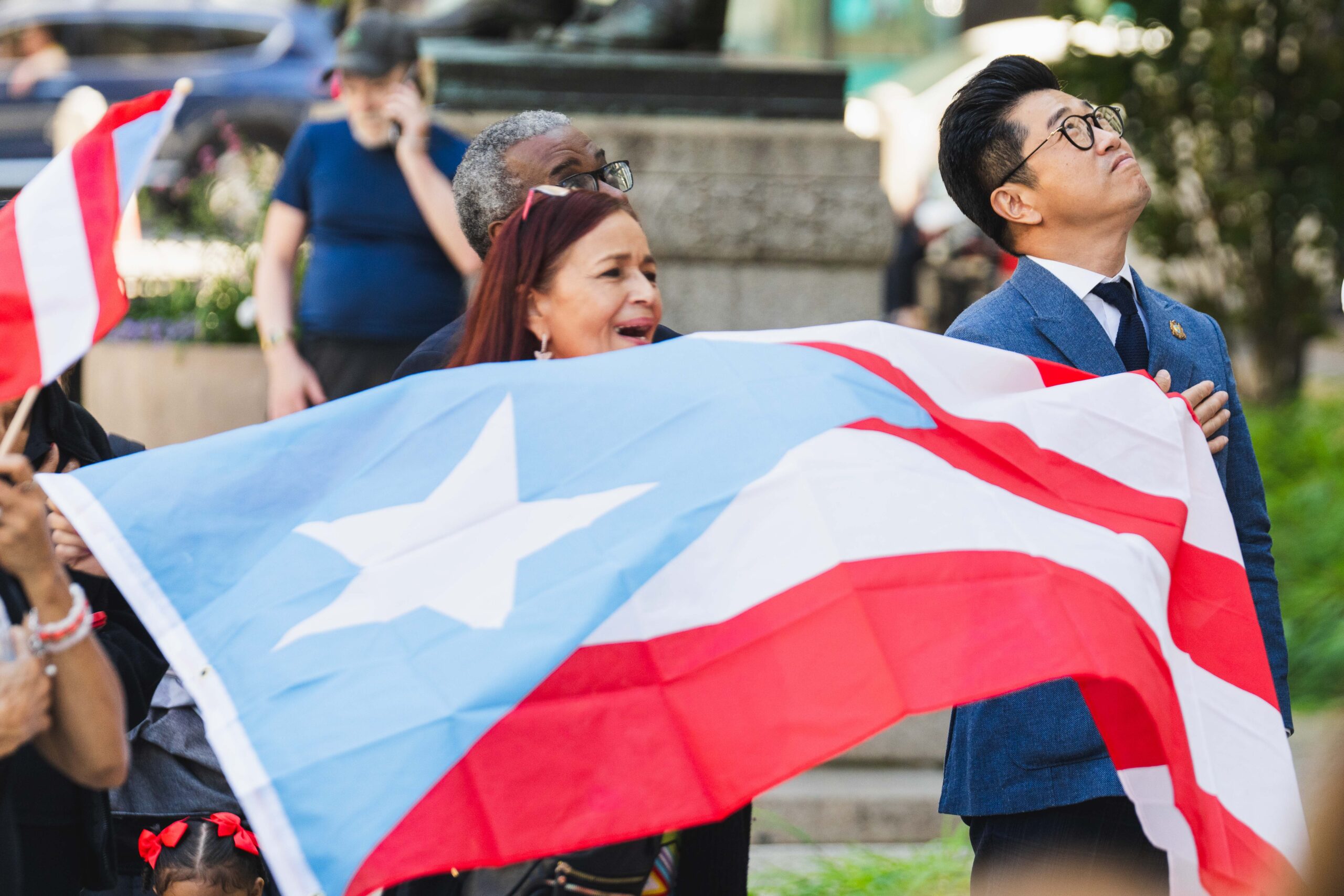 woman waving puerto rican flag